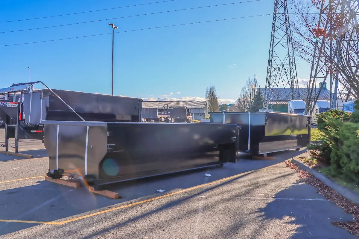 Roll-off dumpster ready for waste disposal at job site for Demolition Dumpster Rental in Asheville